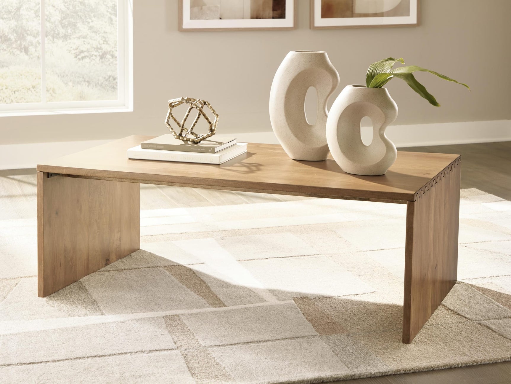 Ella Grove Rich Brown Coffee Table from Decor Furniture