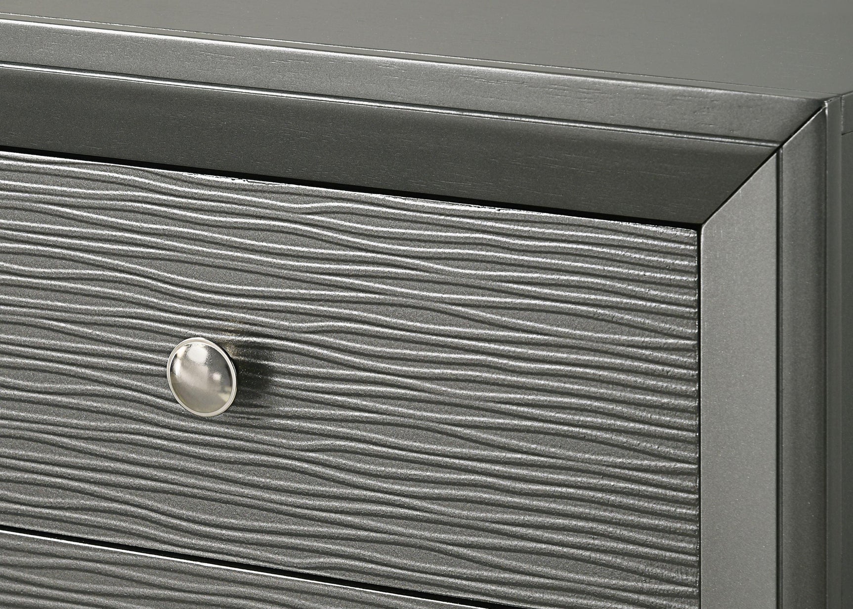 Denker Gunmetal Chest with decorative items on top