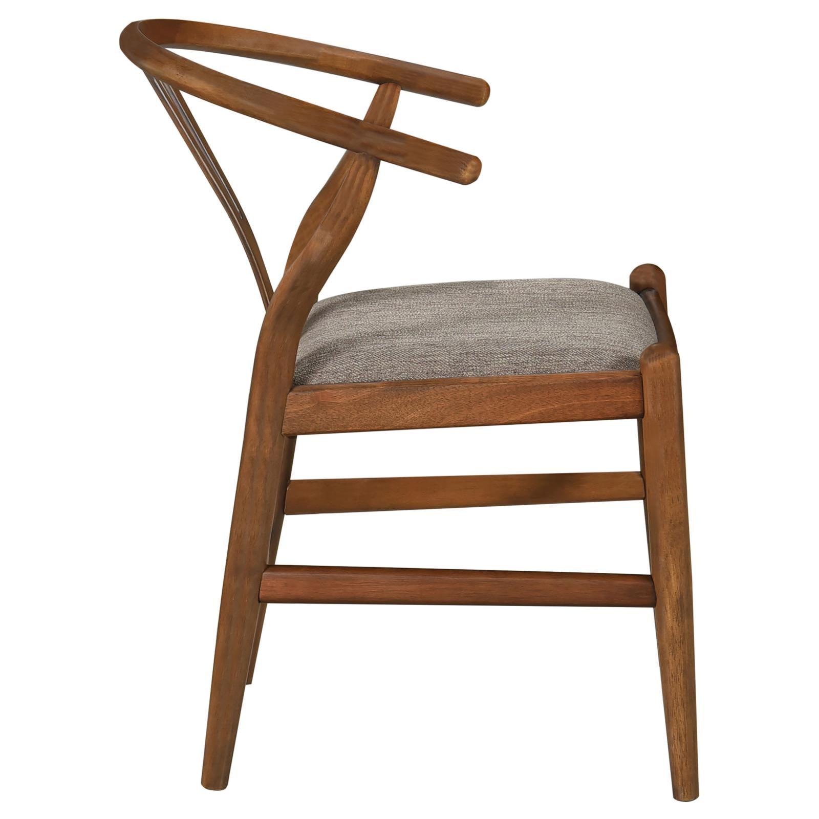 Dining chairs styled in mid-century modern dining room