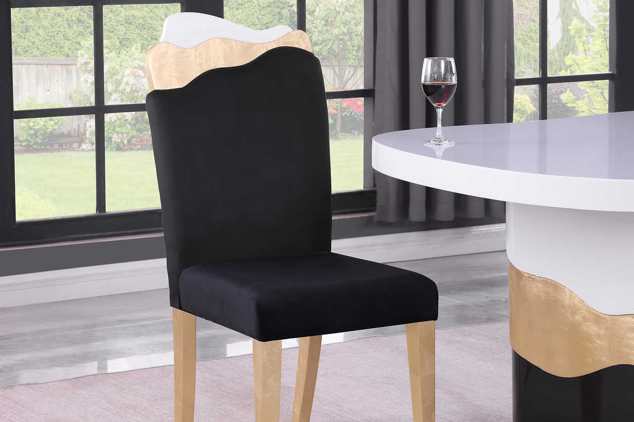 Orion dining set detail view showing gold leaf accents