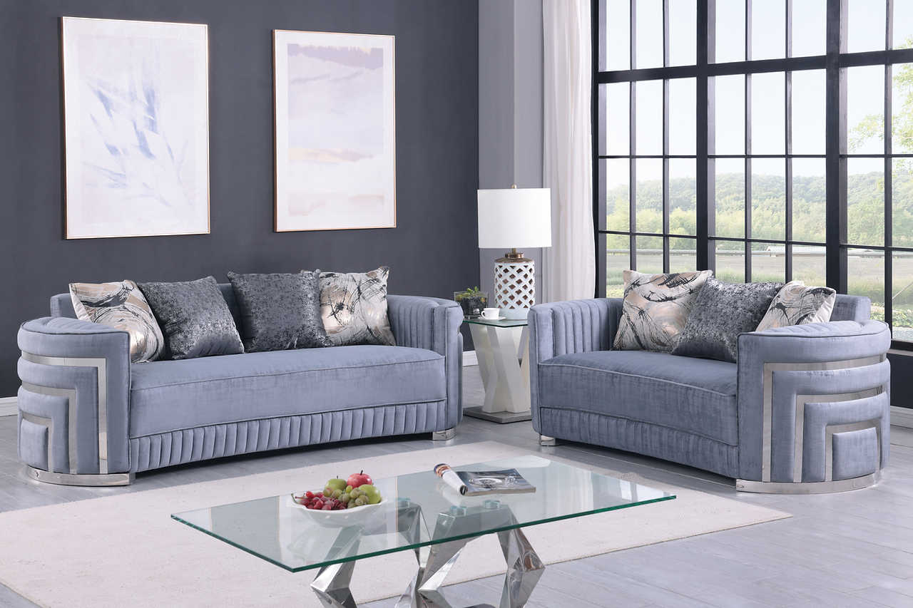 Side angle view of Minerva grey velvet sofa and loveseat