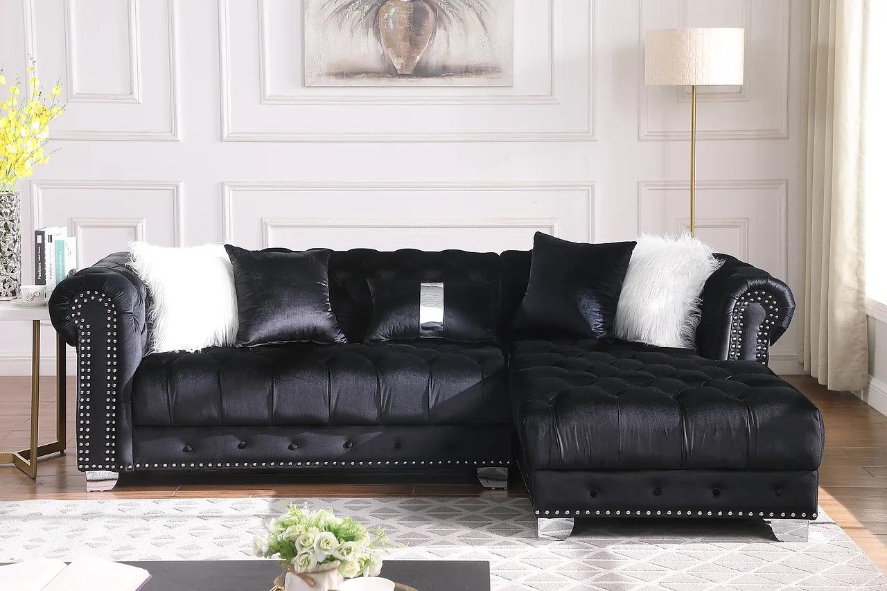 Close-up detail of black velvet tufted upholstery on Yaz sectional