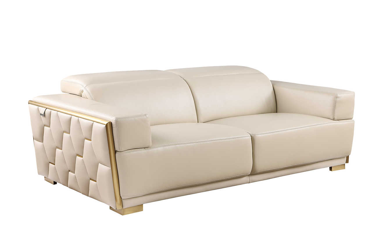 Close-up of brushed gold accents on Hexor leather sofa