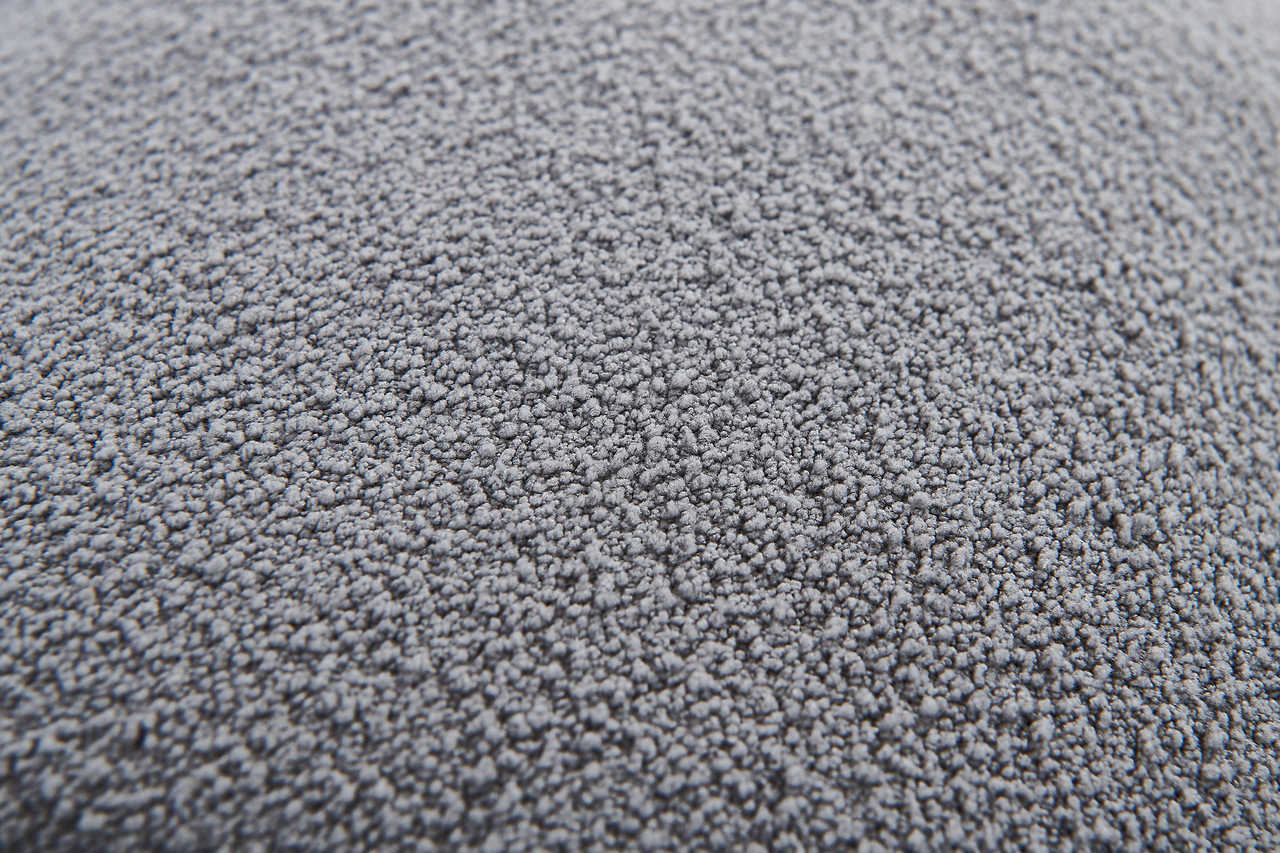 Close-up of bed corner and fabric texture