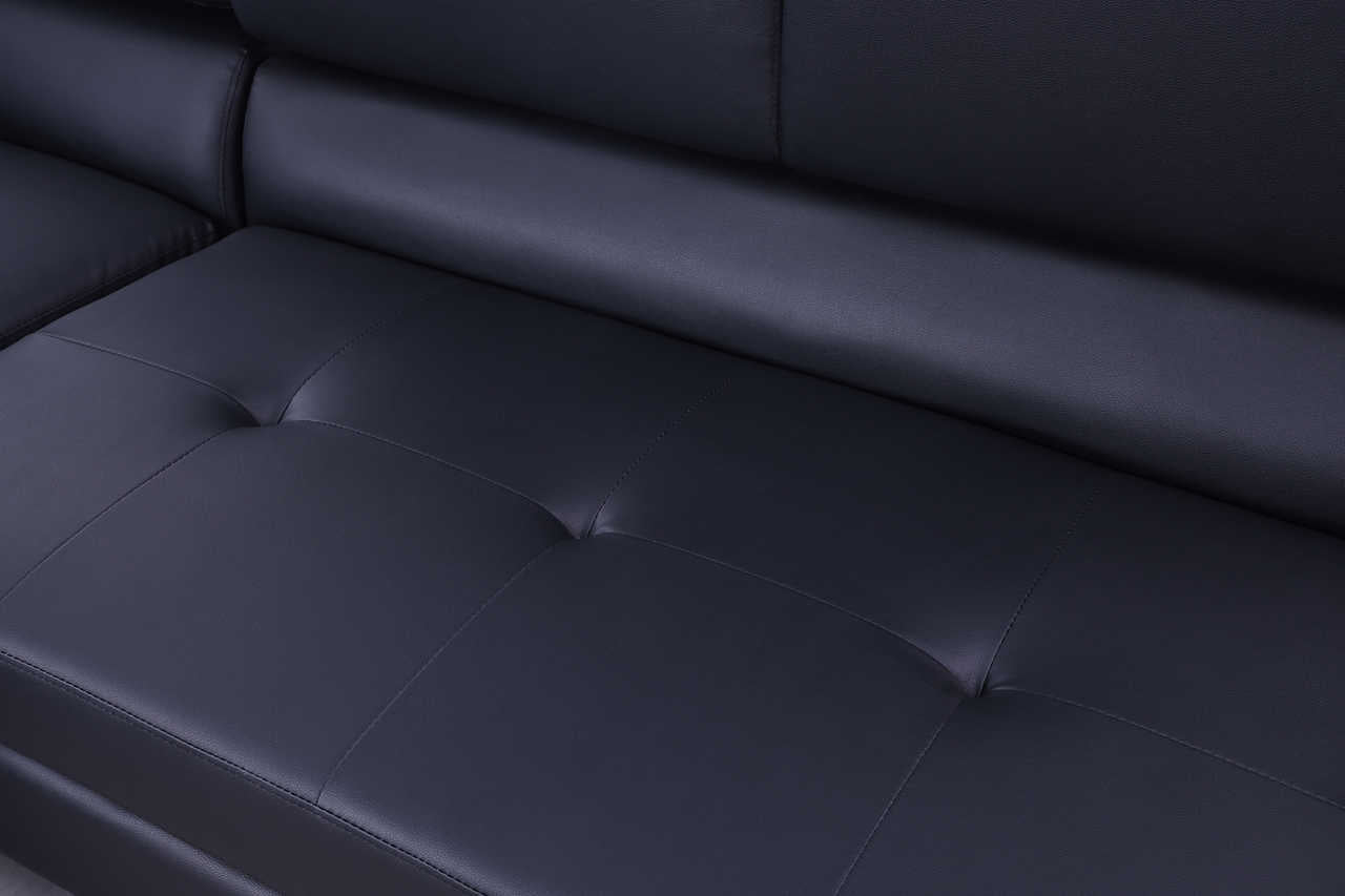 Detail view of sofa's black PU upholstery