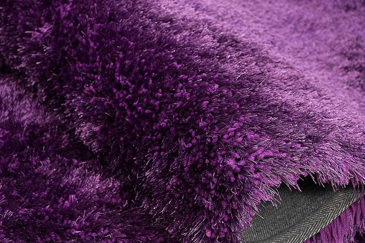 Close-up of Afro Shag Violet Rug's art silk shine finish