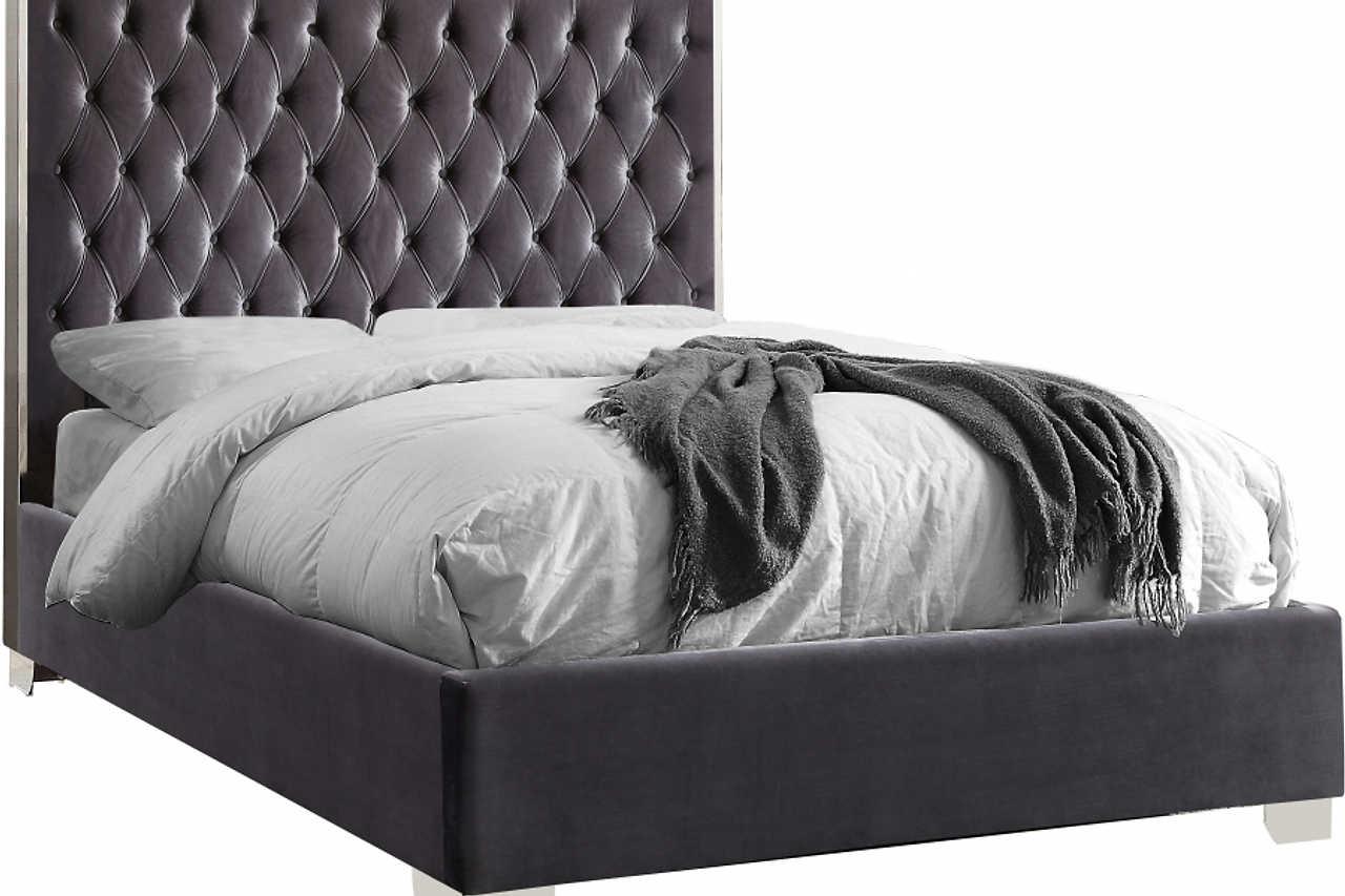 Side angle of Rose Grey Velvet Tufted Platform King Bed with chrome accents