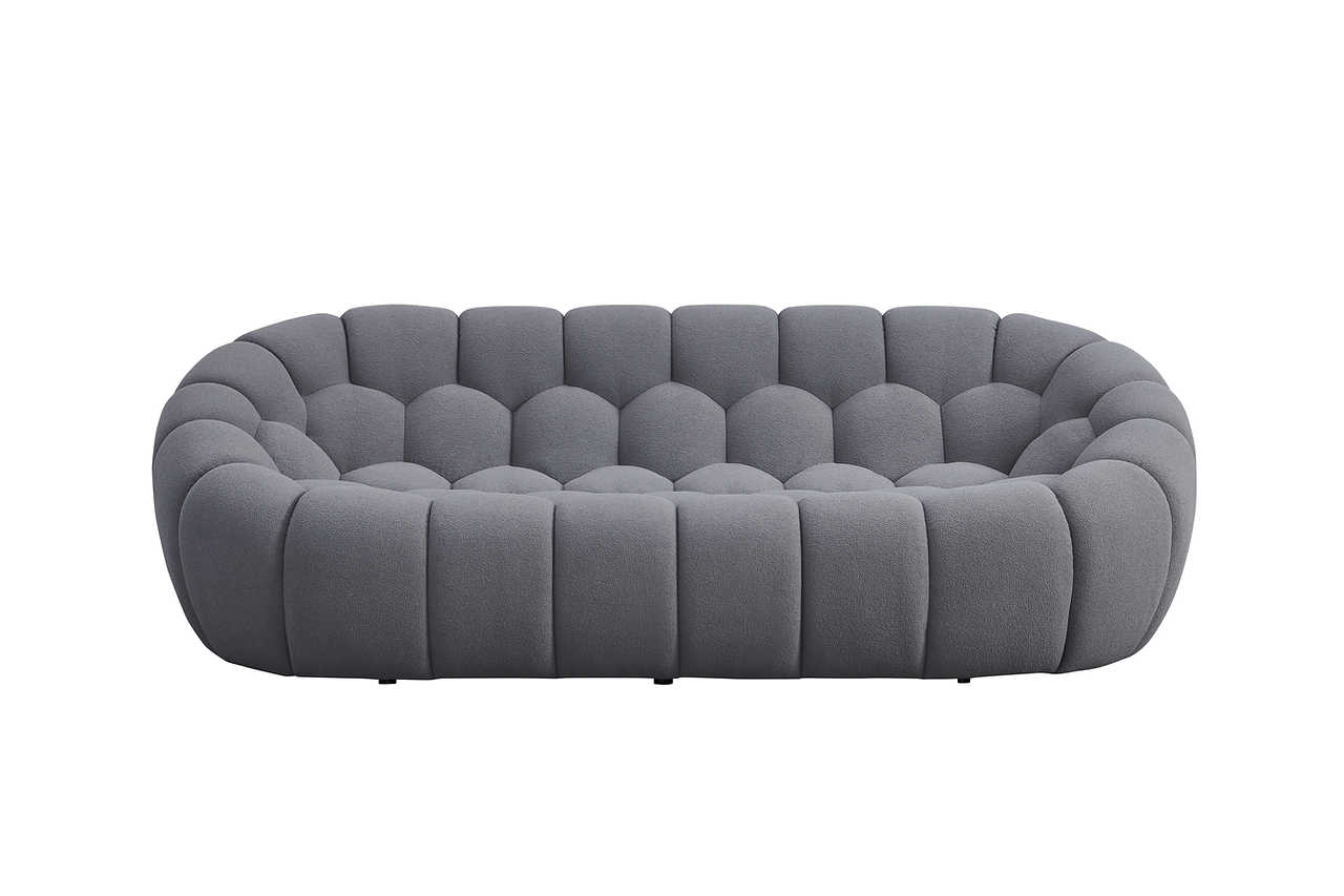 Detail view of grey boucle upholstery on Bubbles Living Room Set