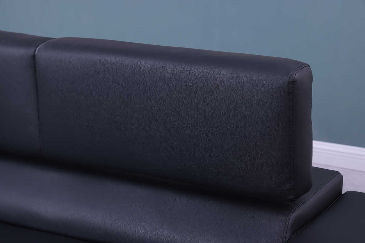 Room layout featuring Magic sectional sofa in black PU