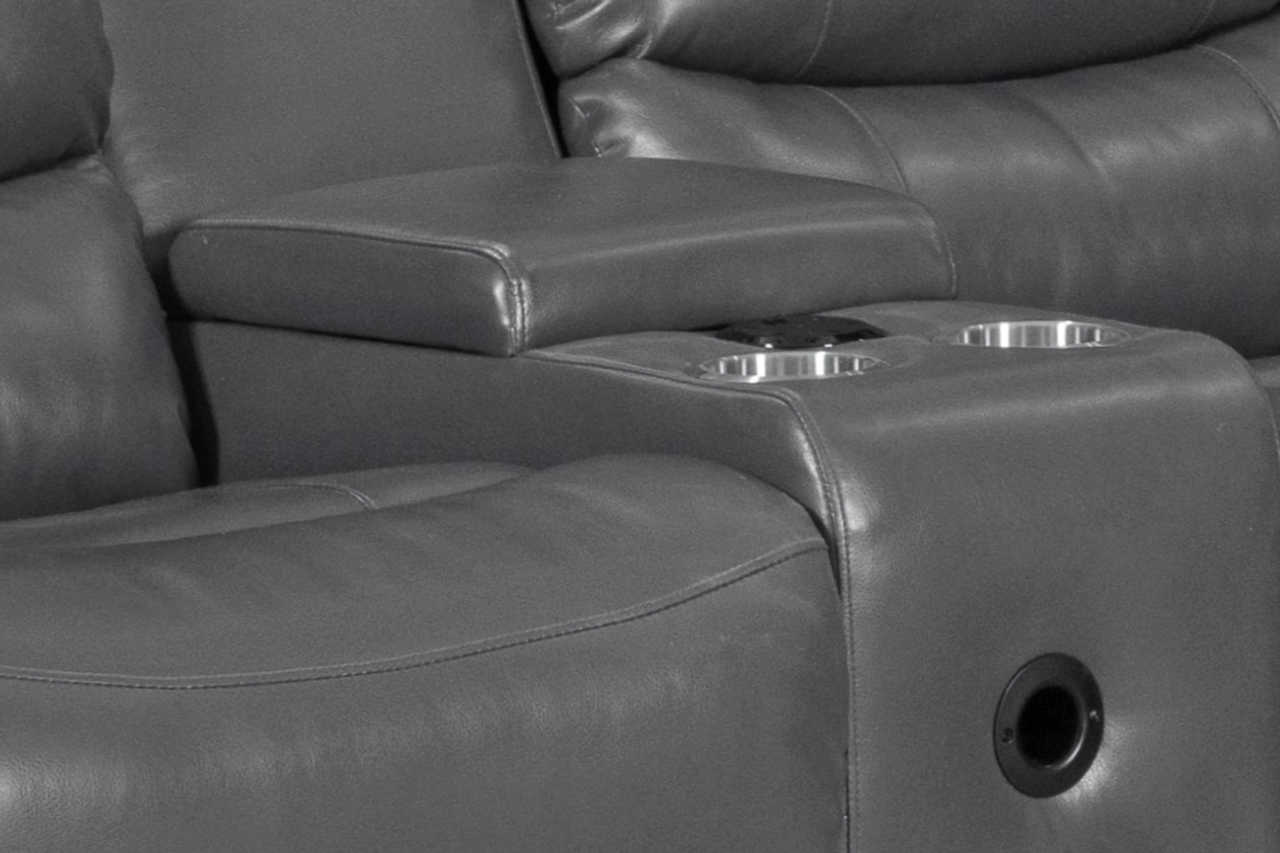 Close-up view of Turbo Grey Power Reclining Sectional USB ports and storage console