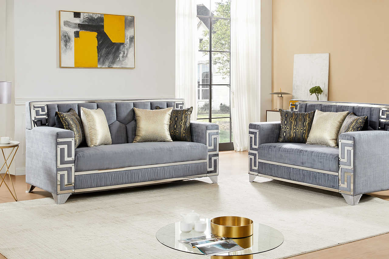 Close-up of silver metal accent on Hira Grey Chair arm
