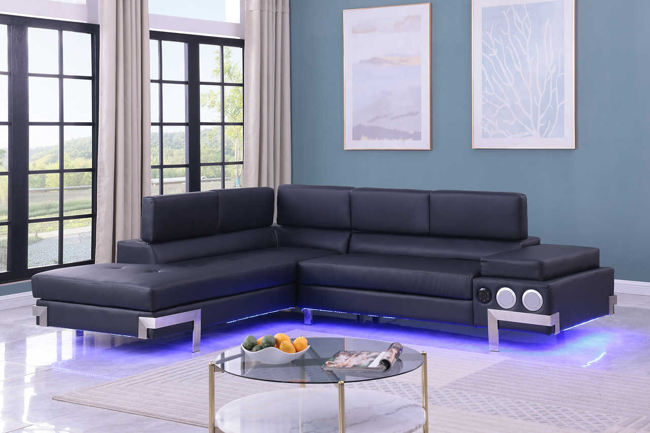Side view of Magic Black PU sectional sofa showcasing adjustable headrests