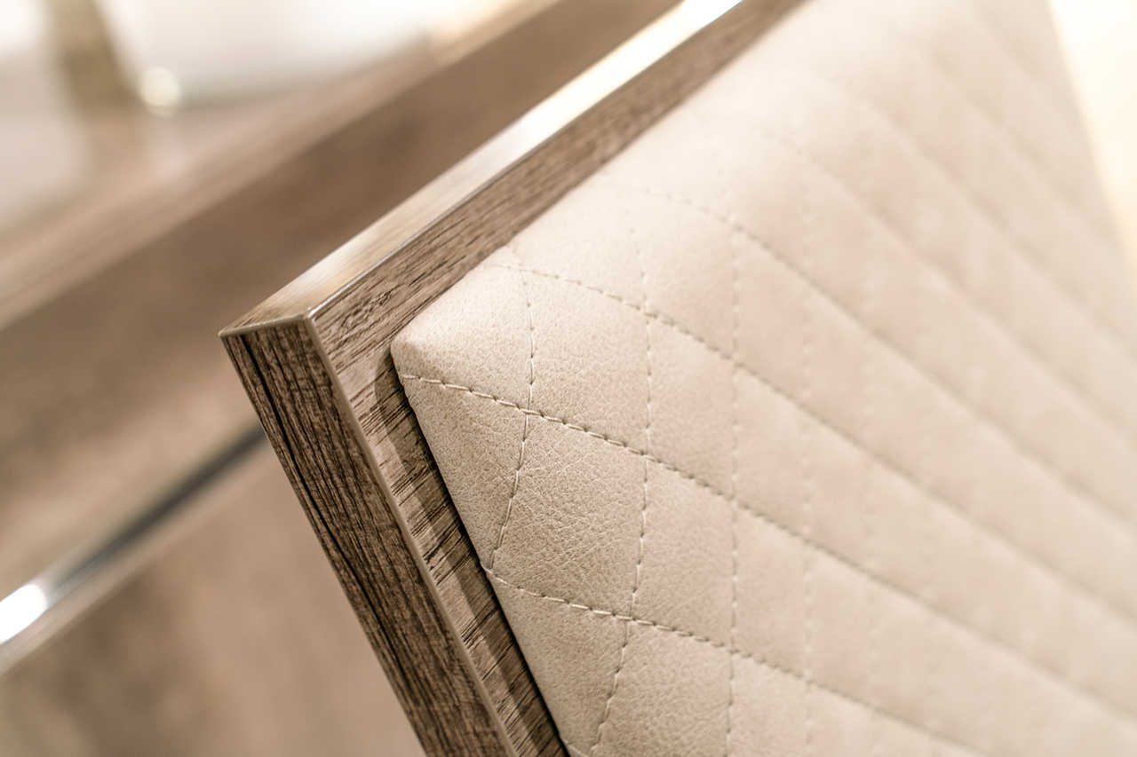 Back view of Medea Leather Dining Chair highlighting design details