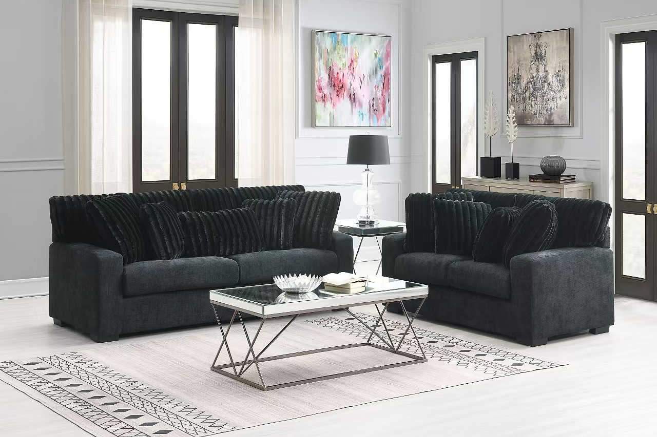 Side view of Tarra black fabric chair