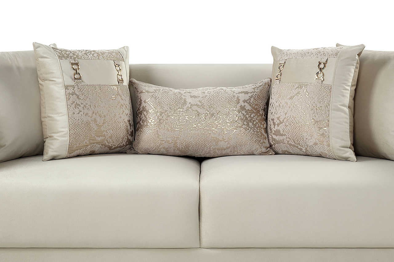 Close-up detail of Monaco Cream Velvet fabric and gold accents