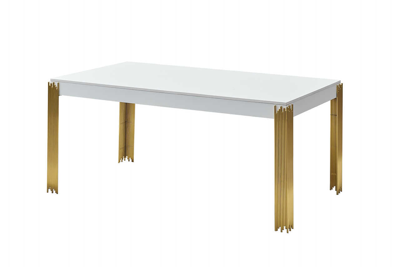 Detail of chair velvet upholstery and gold finish on dining set