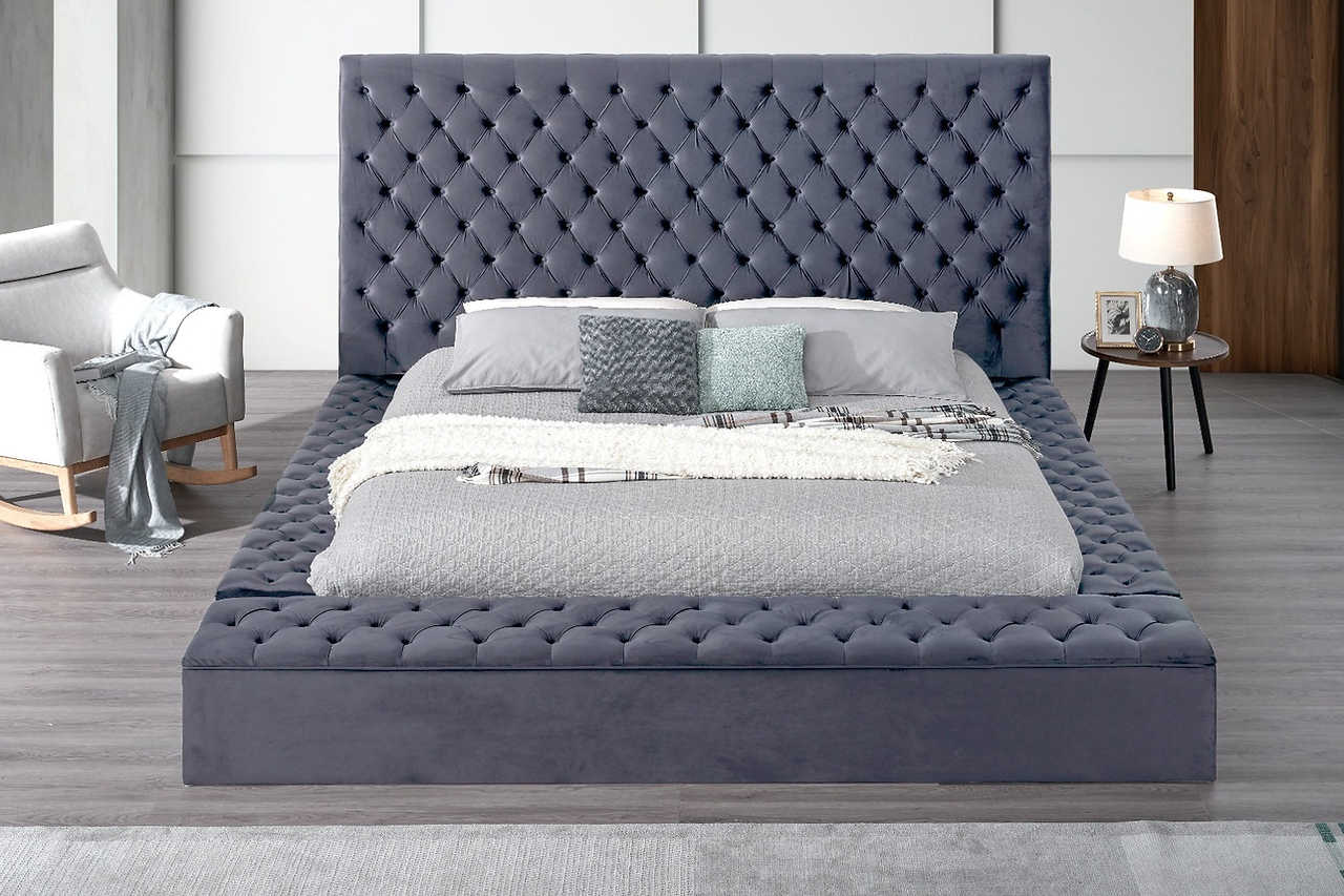 Footboard view showing grey upholstery and slats