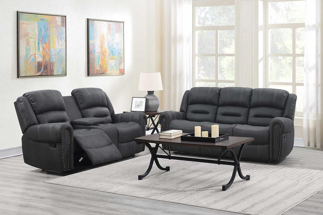 Houston loveseat in dark grey fabric demonstrating reclining position