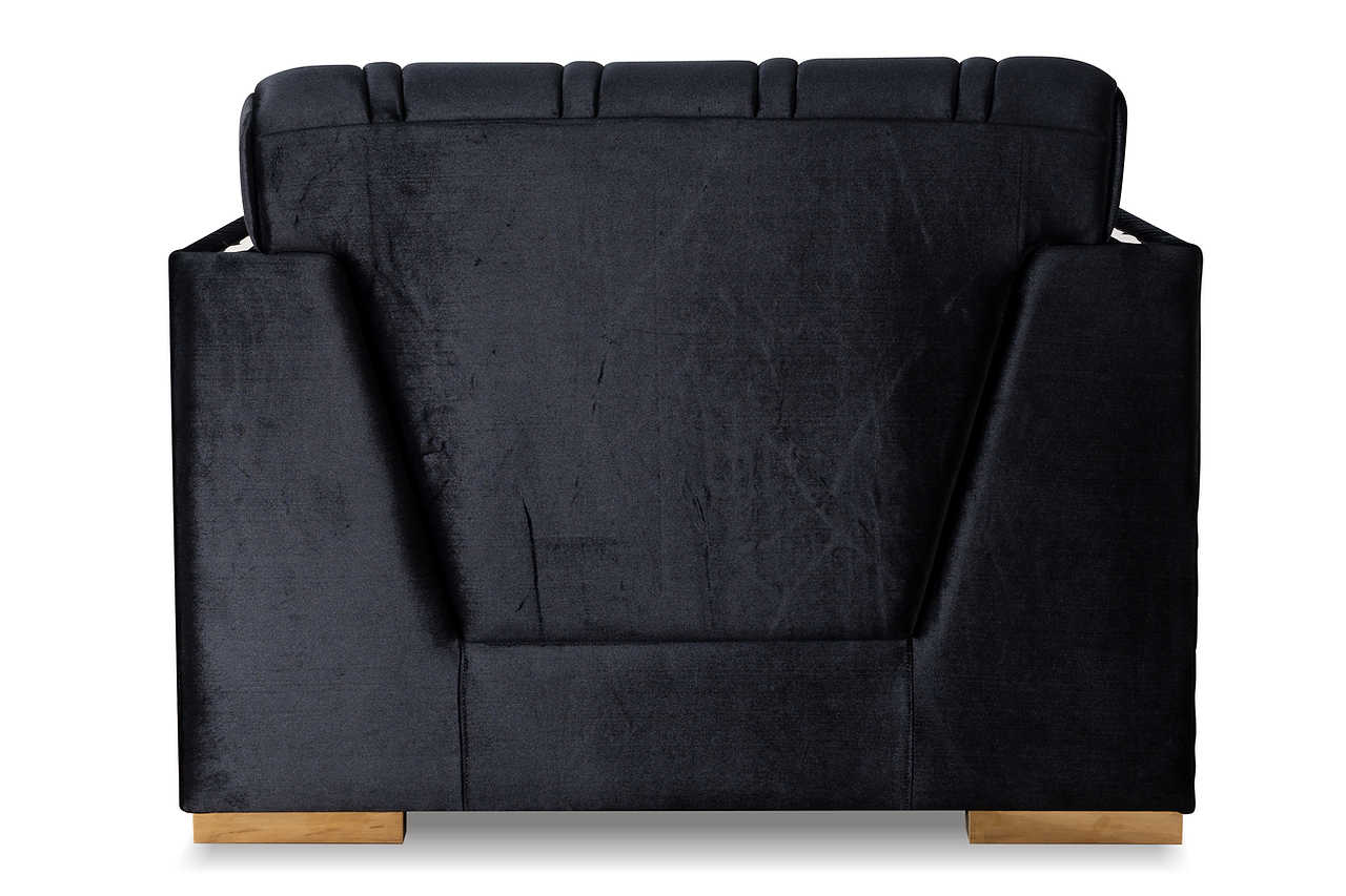 Close-up of gold accent and velvet fabric