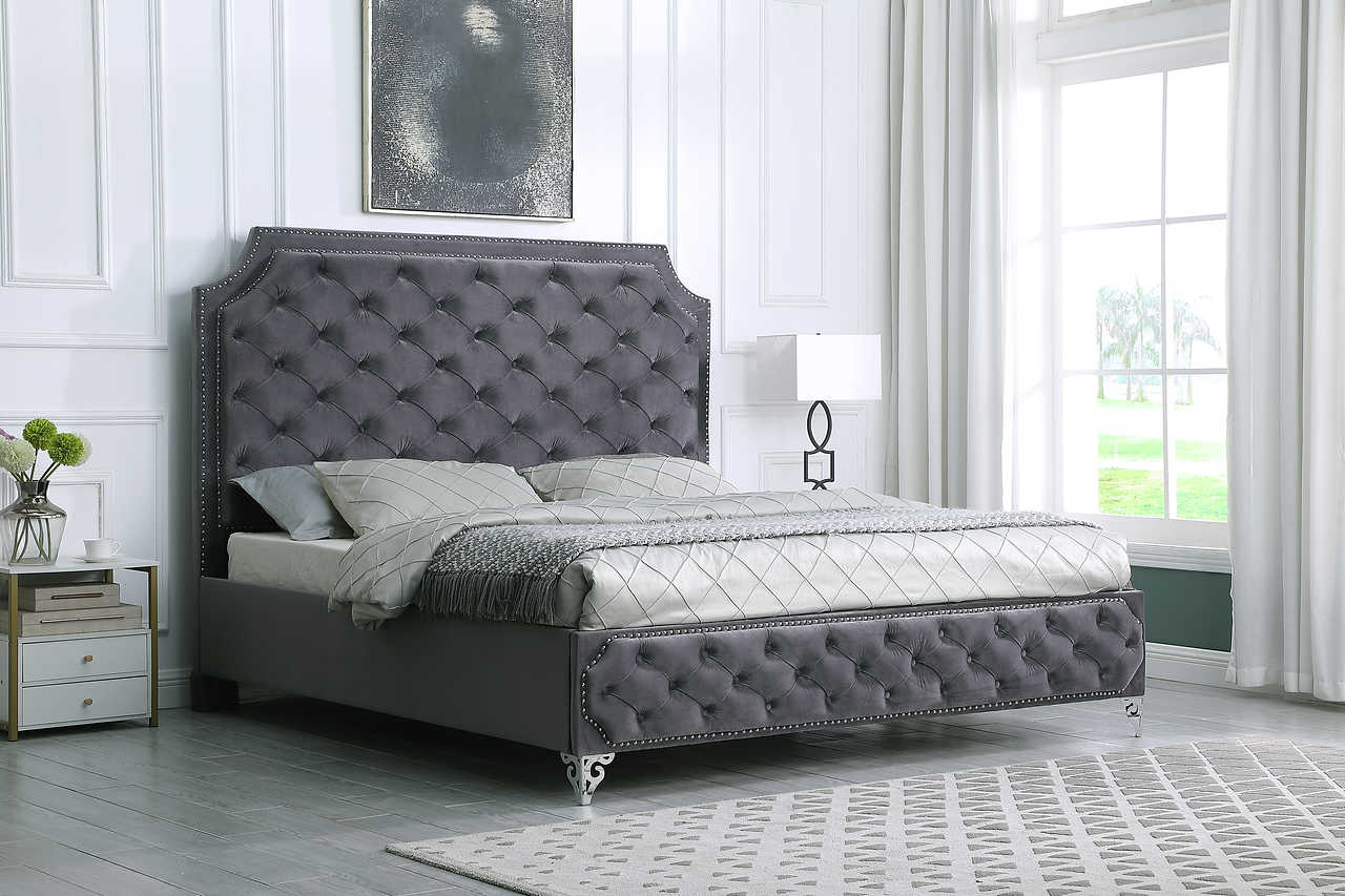 Close-up of tufted velvet headboard on Leilah king bed