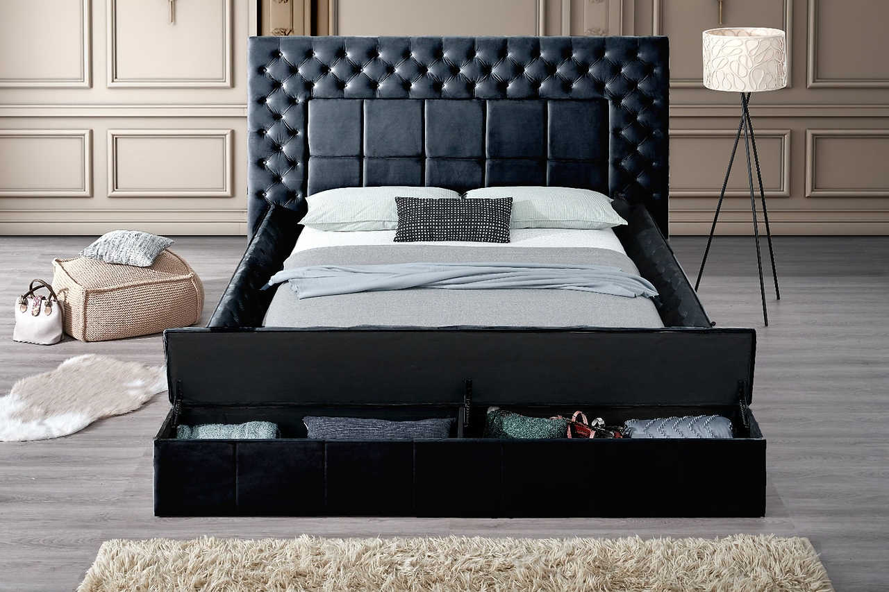 Close-up of tufted black upholstered headboard