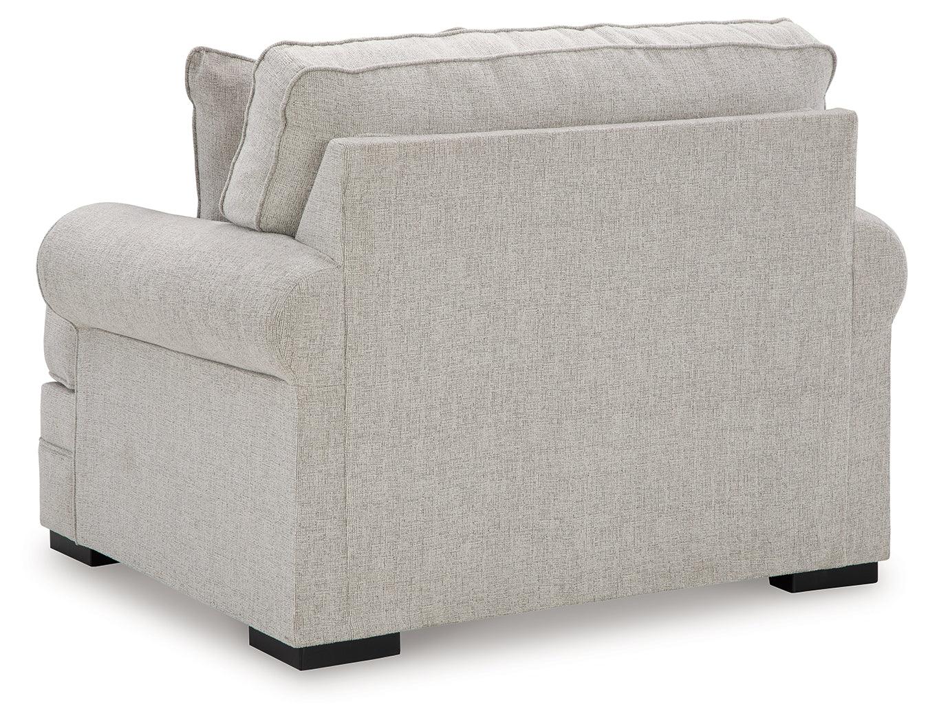 Eastonbridge Shadow Chenille Oversized Chair showing feet with faux wood finish