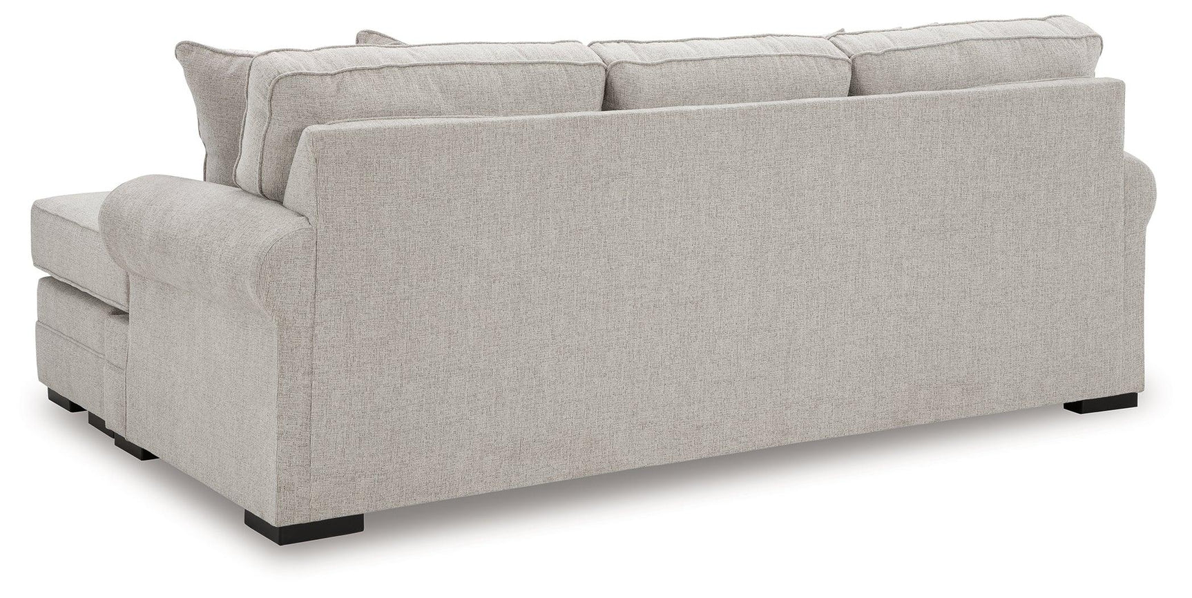 Close-up detail of sofa chaise arm and upholstery