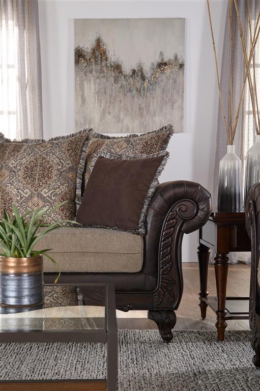 Elmbrook brown upholstered rolled arm sofa side view