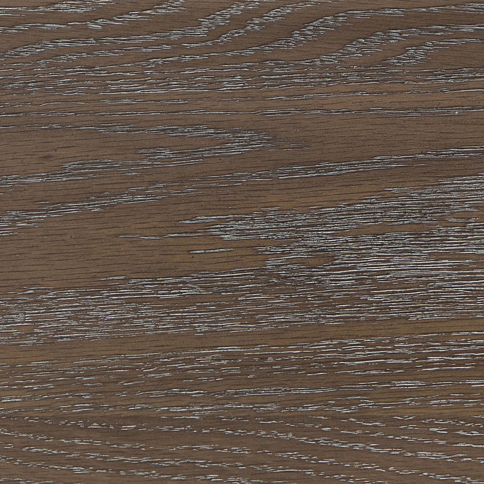 Detailed view of wire-brushed distressing on walnut frame