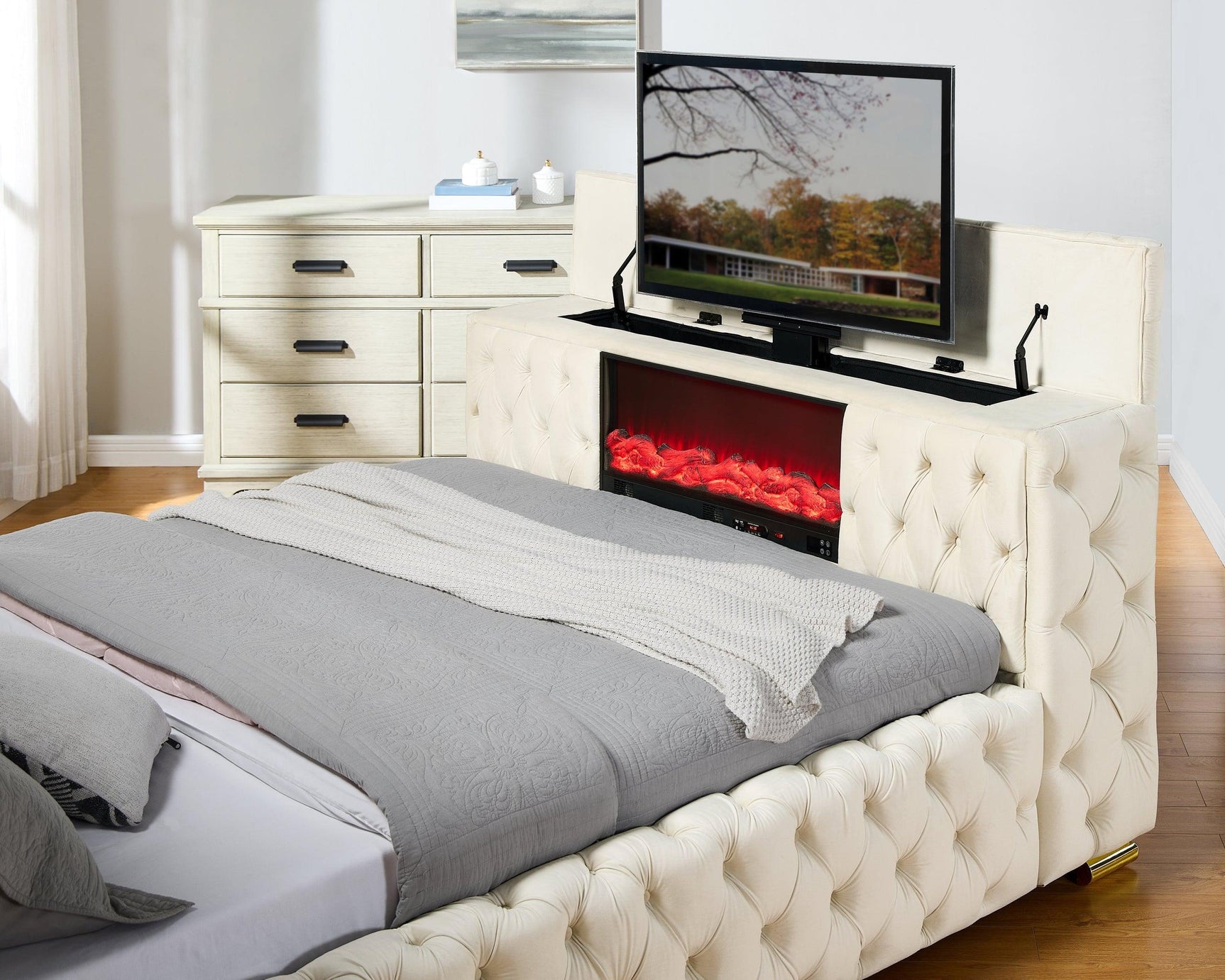 Footboard detail with fireplace and pull-out TV stand