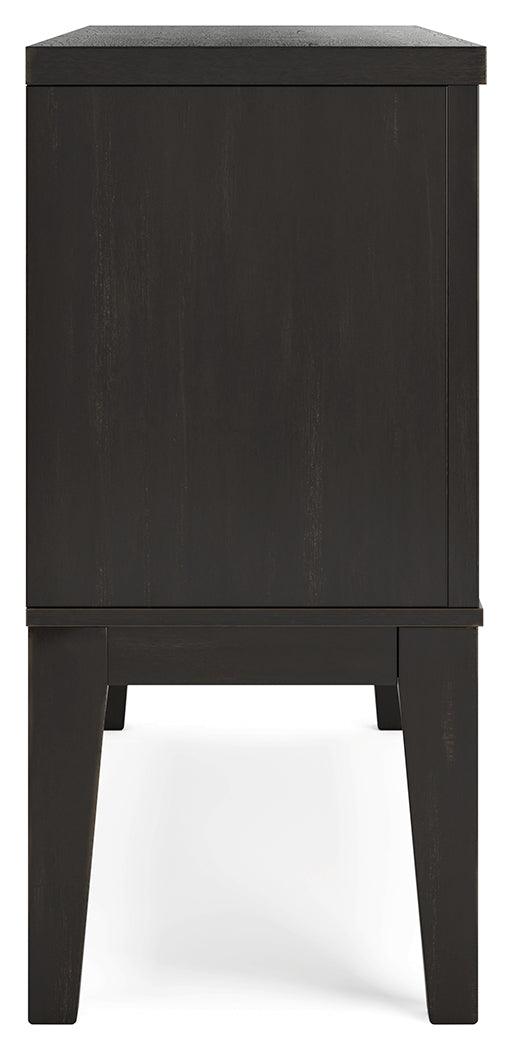 Decorative styling on top of Galliden black dining server