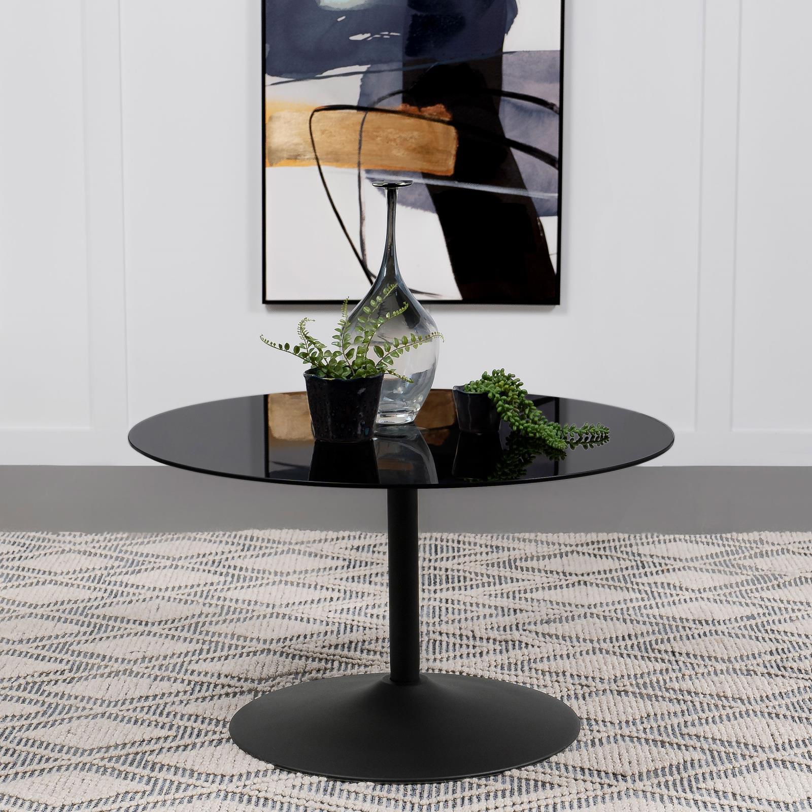 Ganso round coffee table showing black powder coated metal base