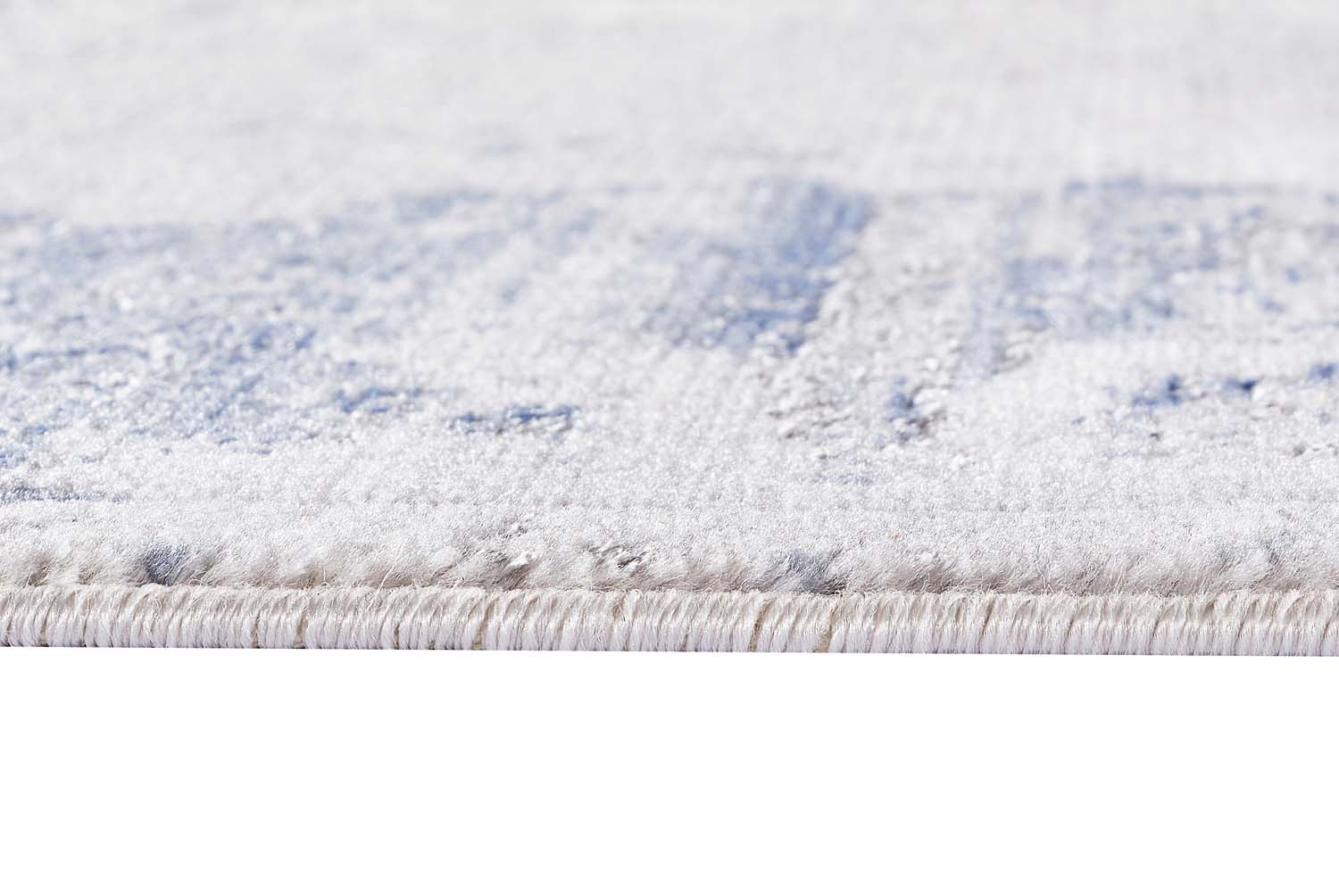 Glitz 715 Steel area rug 5x7 corner detail