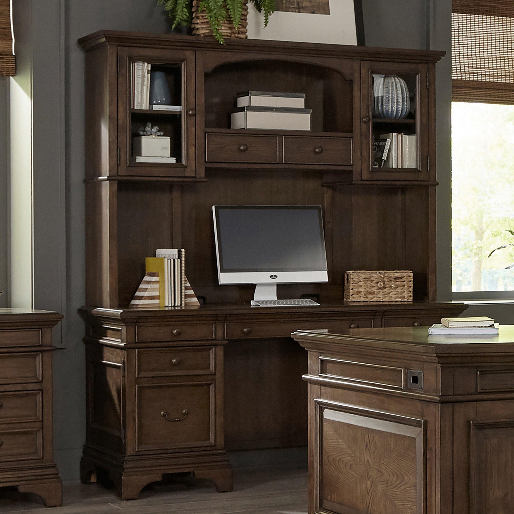 Side angle of Hartshill Credenza with Burnished Oak finish