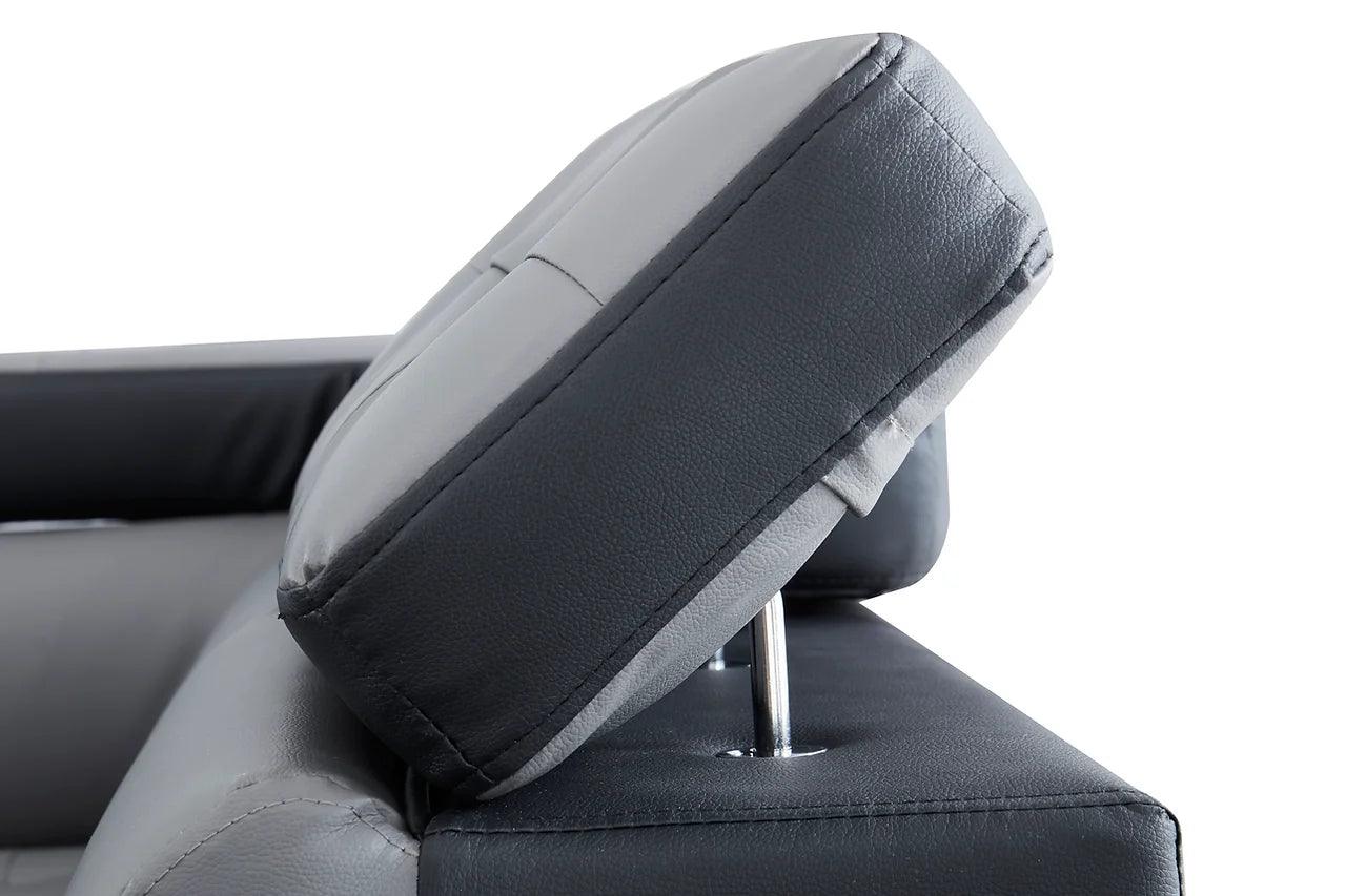 Detail view of Izzi Grey and Black tufted sectional sofa upholstery and accents