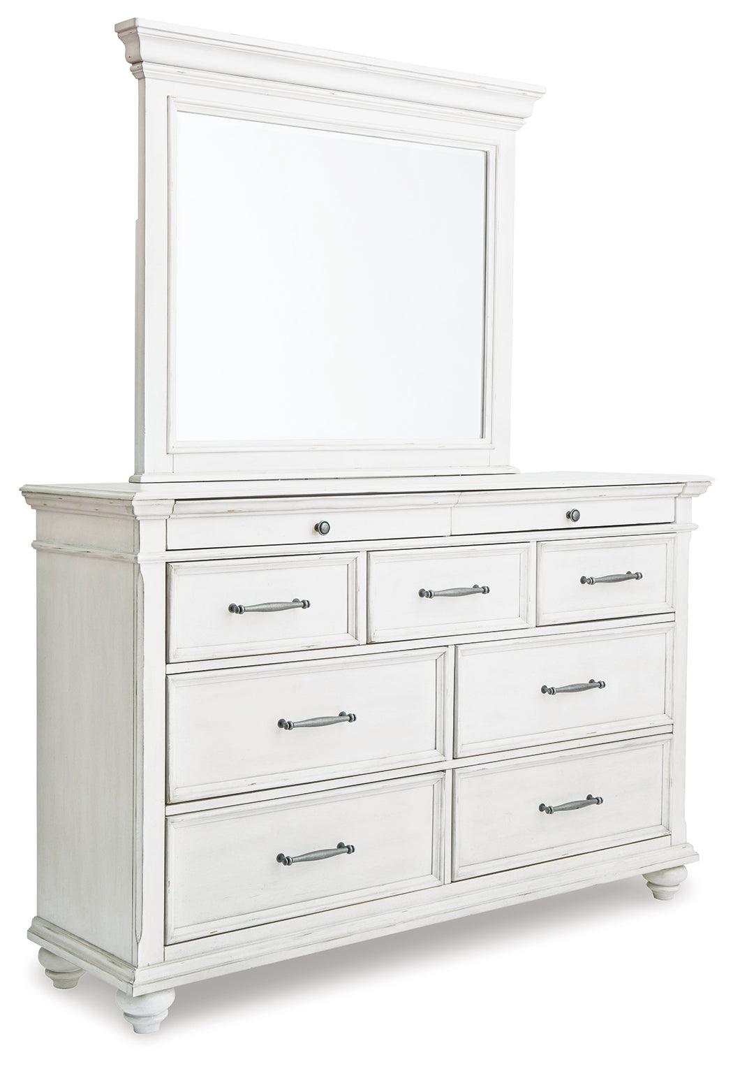 Bedroom scene with Kanwyn Whitewash Panel Bedroom Set bed