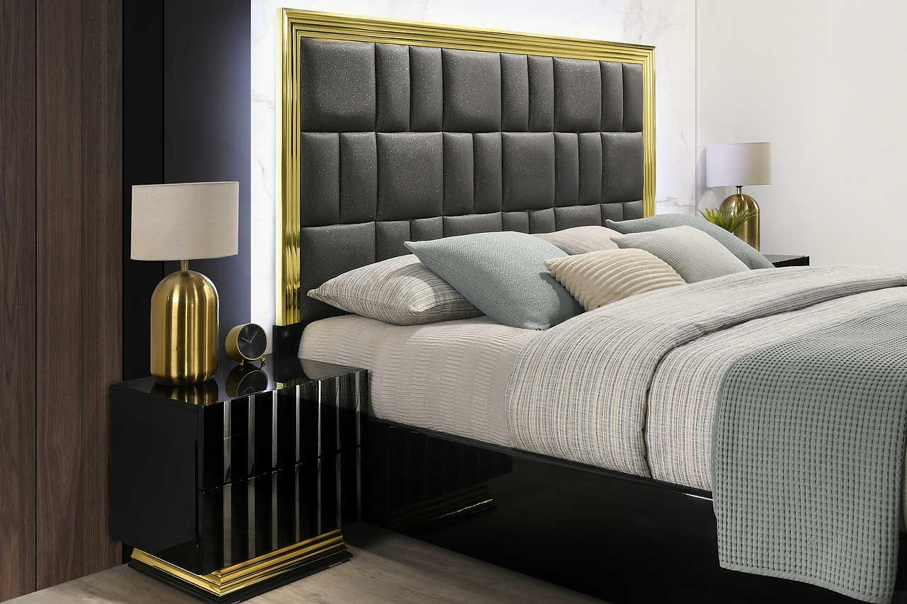 side view of Lila Black Gold Upholstered Panel Bedroom Set bed