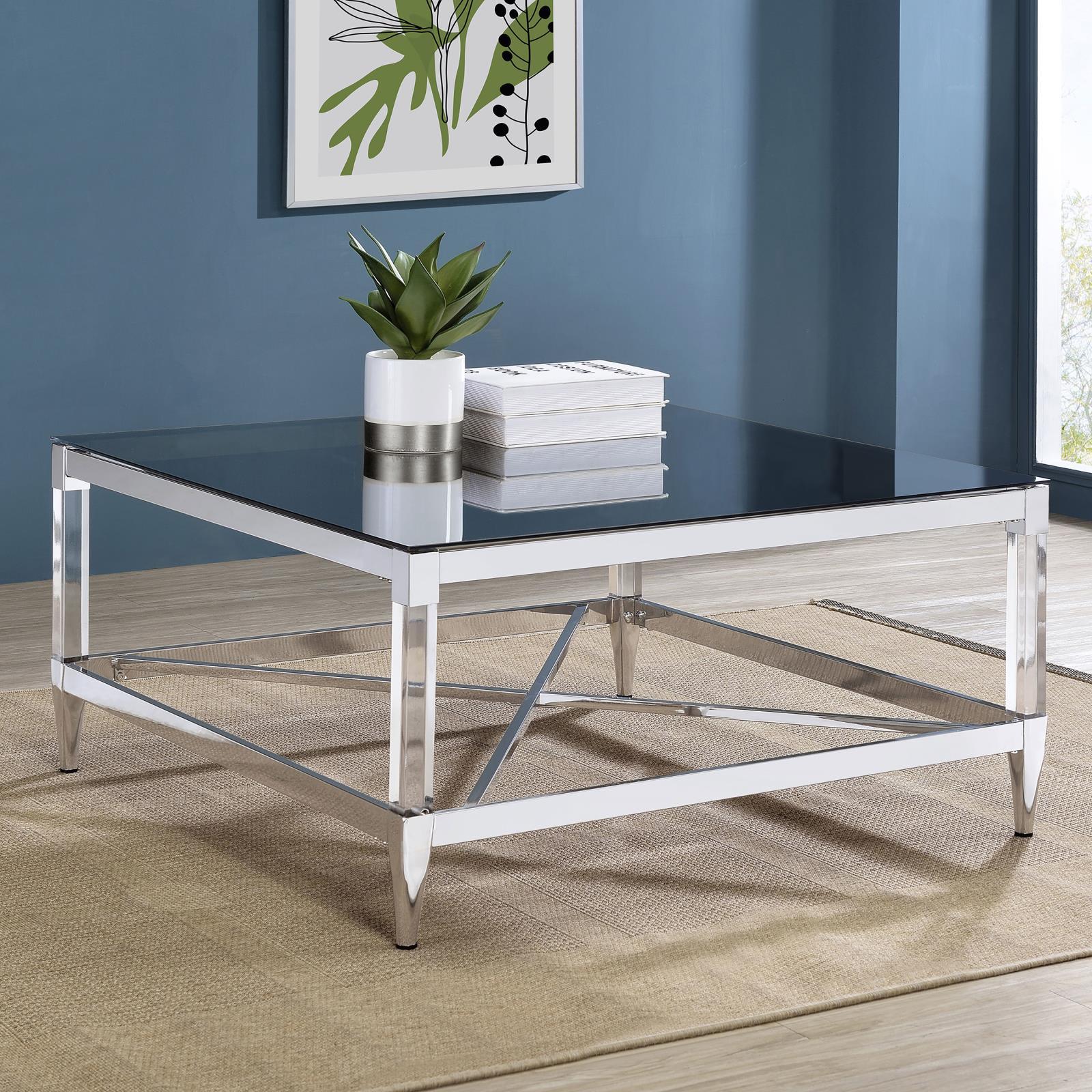 Close-up of chrome metal frame and acrylic legs of Lindley coffee table