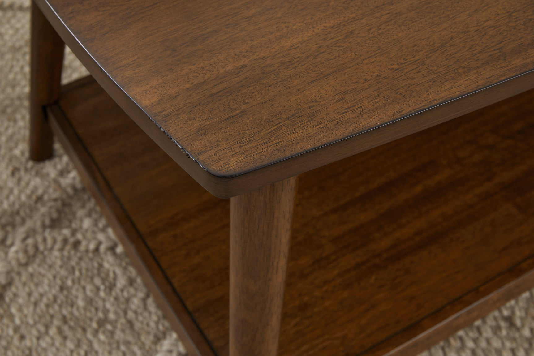 Lyncott Medium Brown Wood Table Set multiple angles in showroom