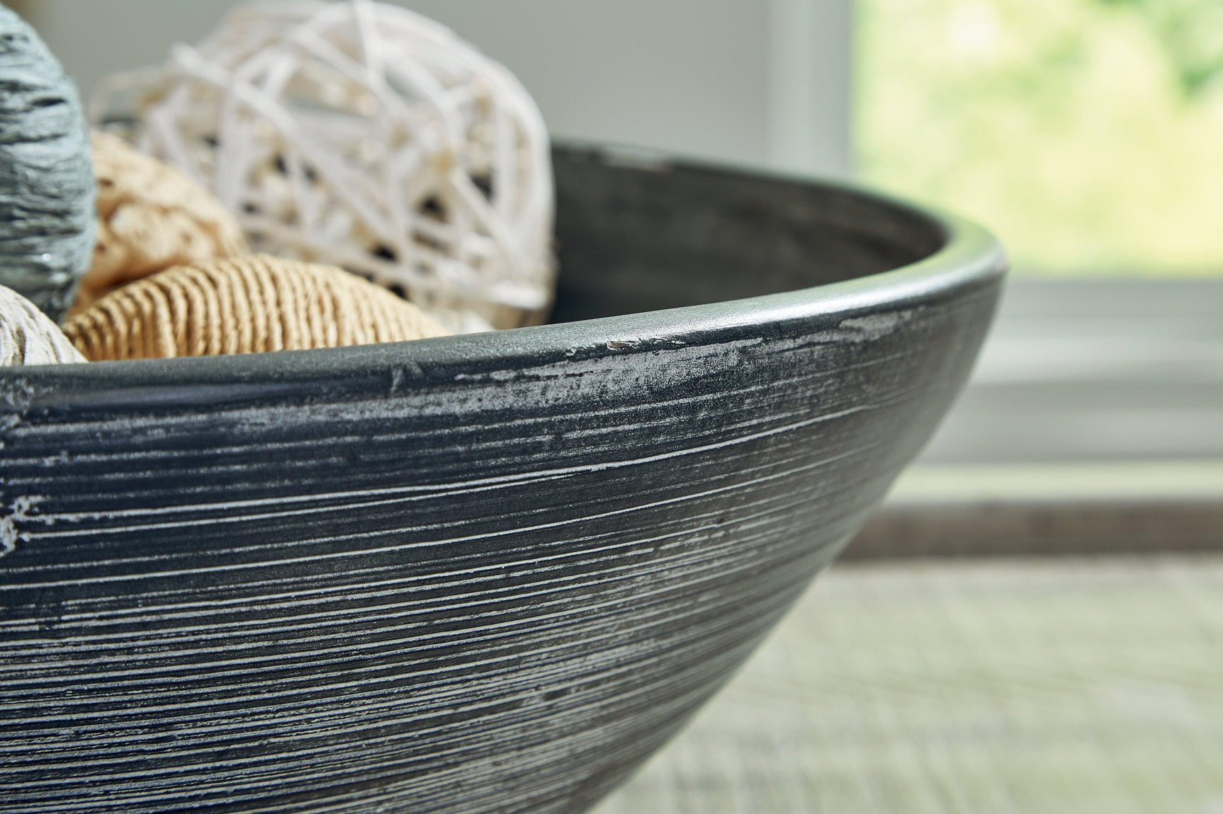 Close-up of Meadie bowl distressed finish
