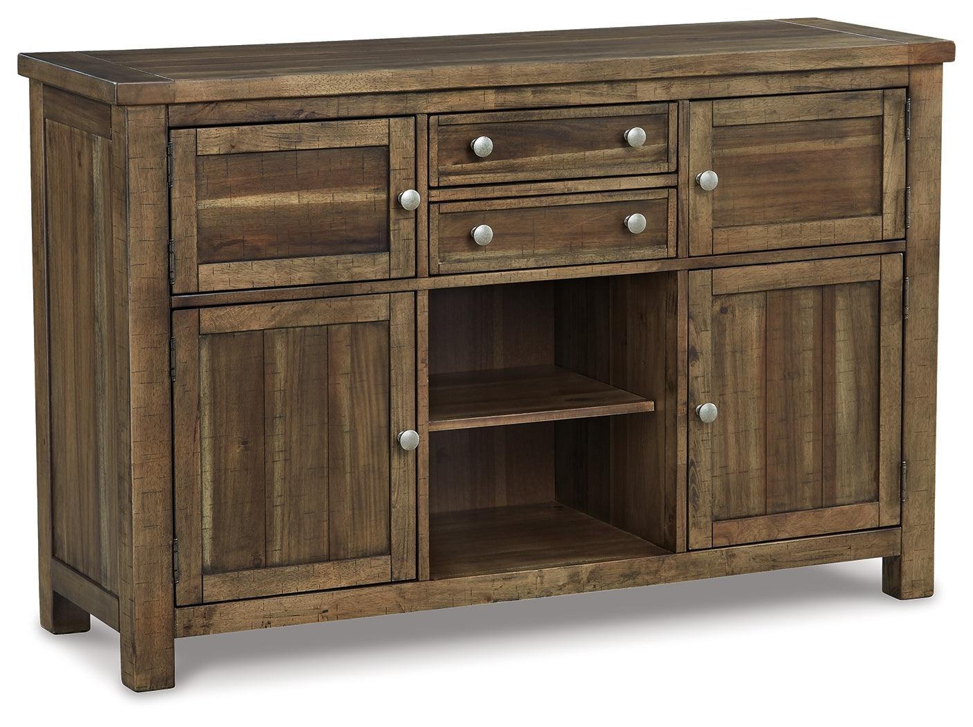 Detailed view of distressed nutmeg finish and antiqued bronze-tone hardware on server drawer