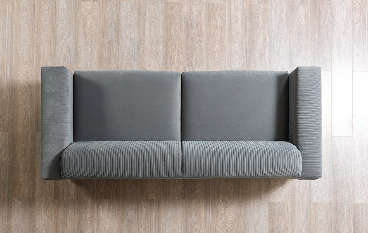 Gray velvet sofa cushions detail