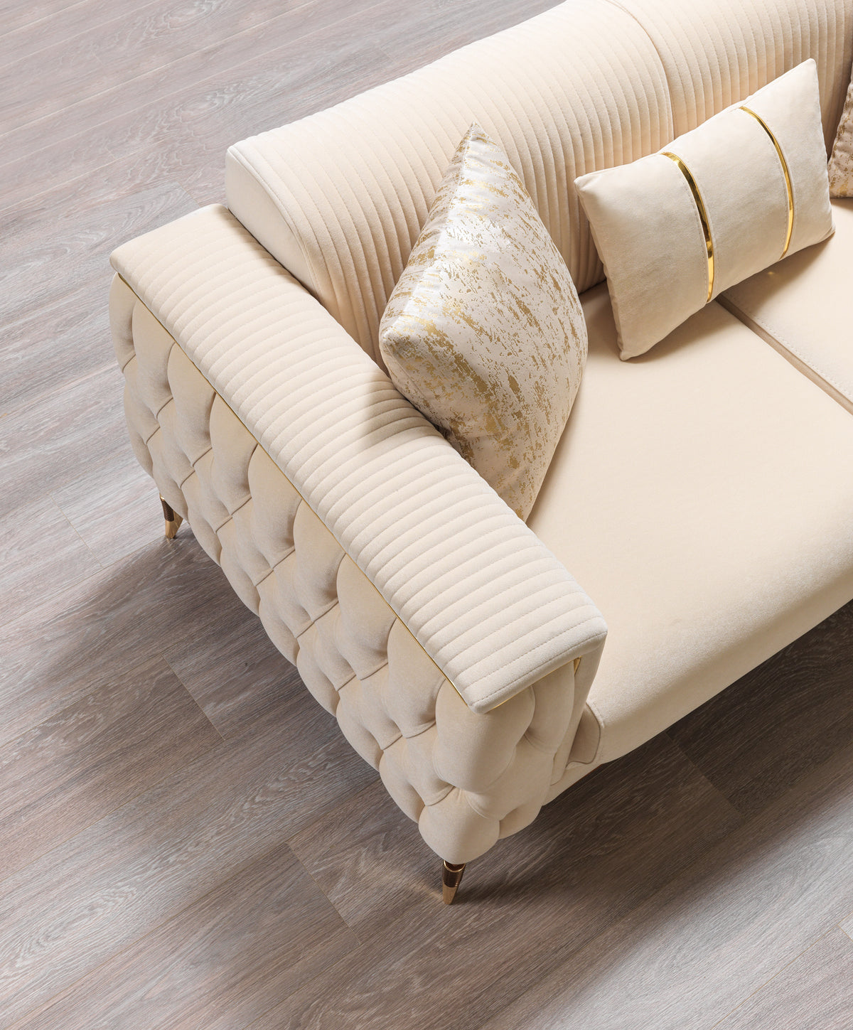 Front angle showing sofa cushions and velvet texture
