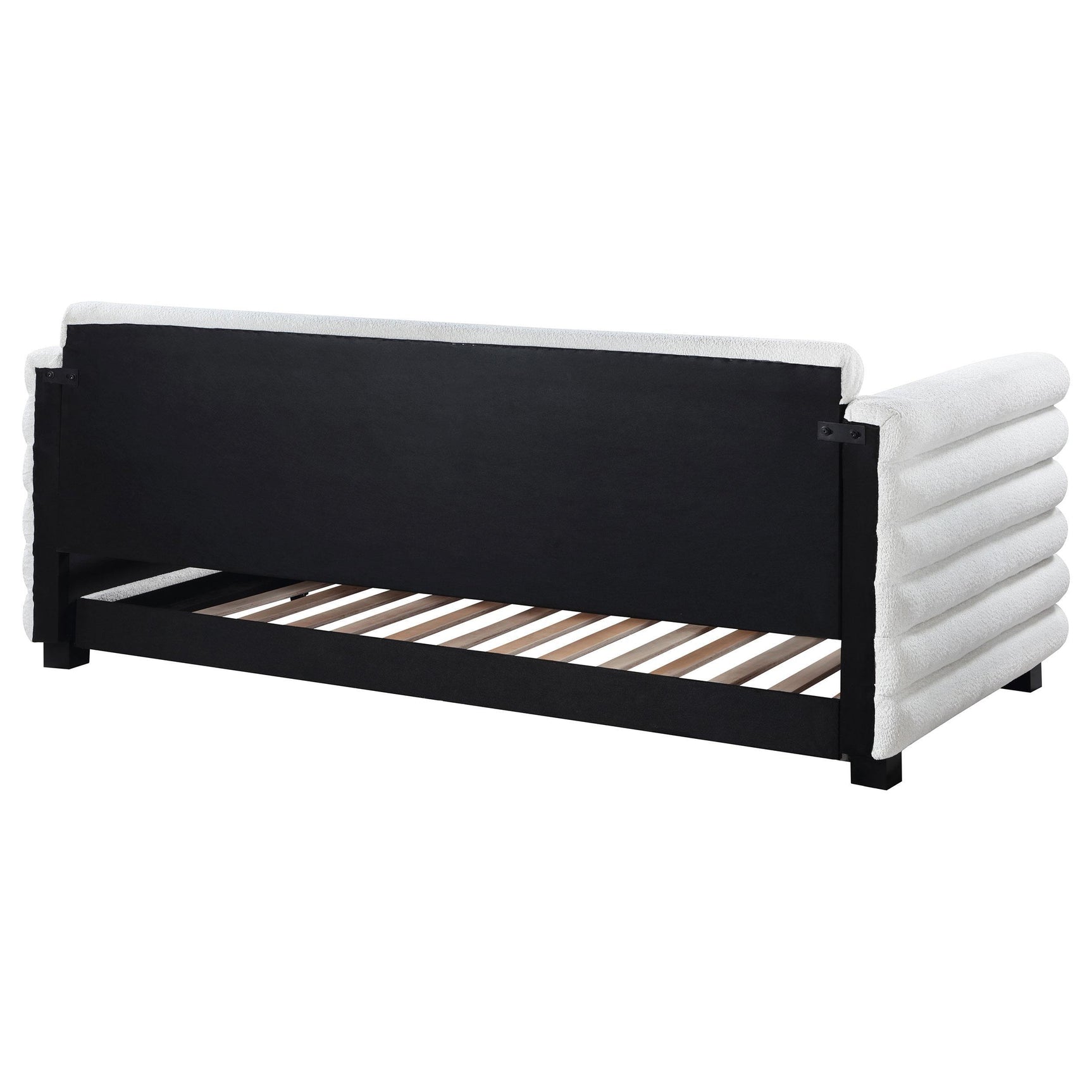 White upholstery on Patricia daybed highlighting foam and stitching