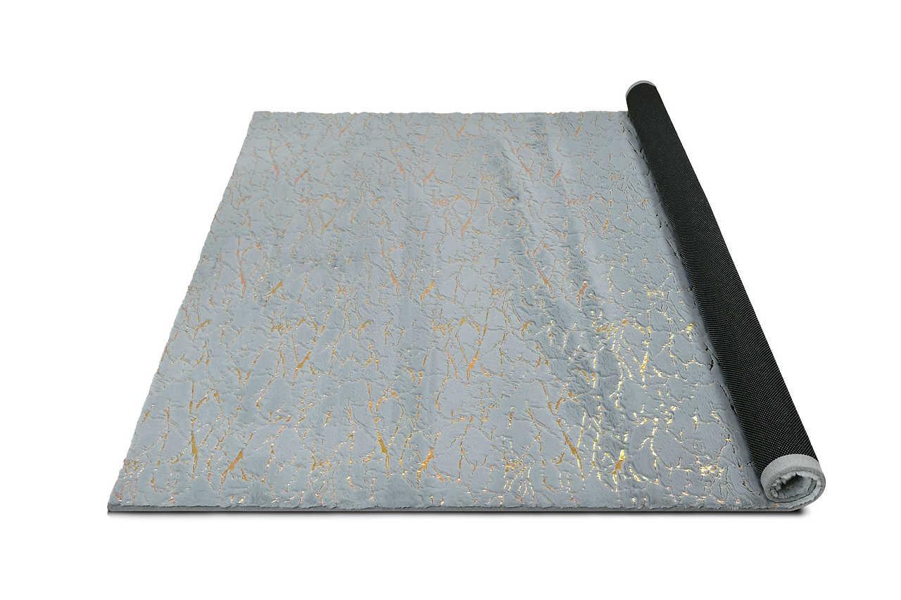 Side angle of Rabbit Silver Gold medium rug detail
