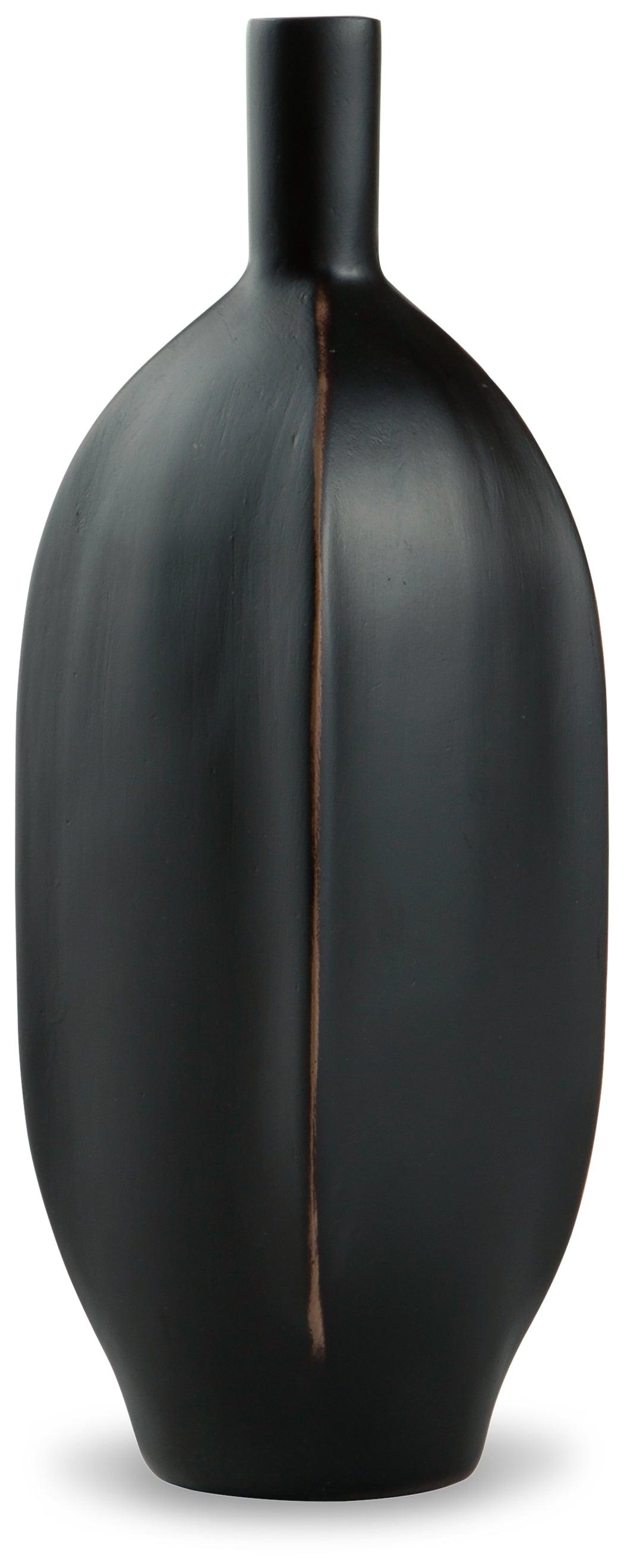Close-up of black polyresin Rhaveney Vases with geometric patterns