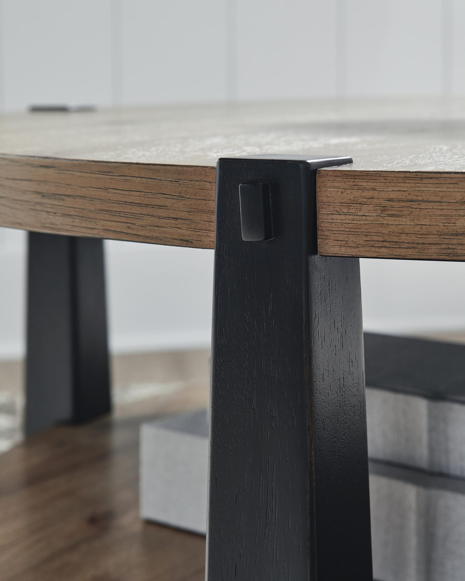 Ridgester Light Brown/Black Coffee Table detail view