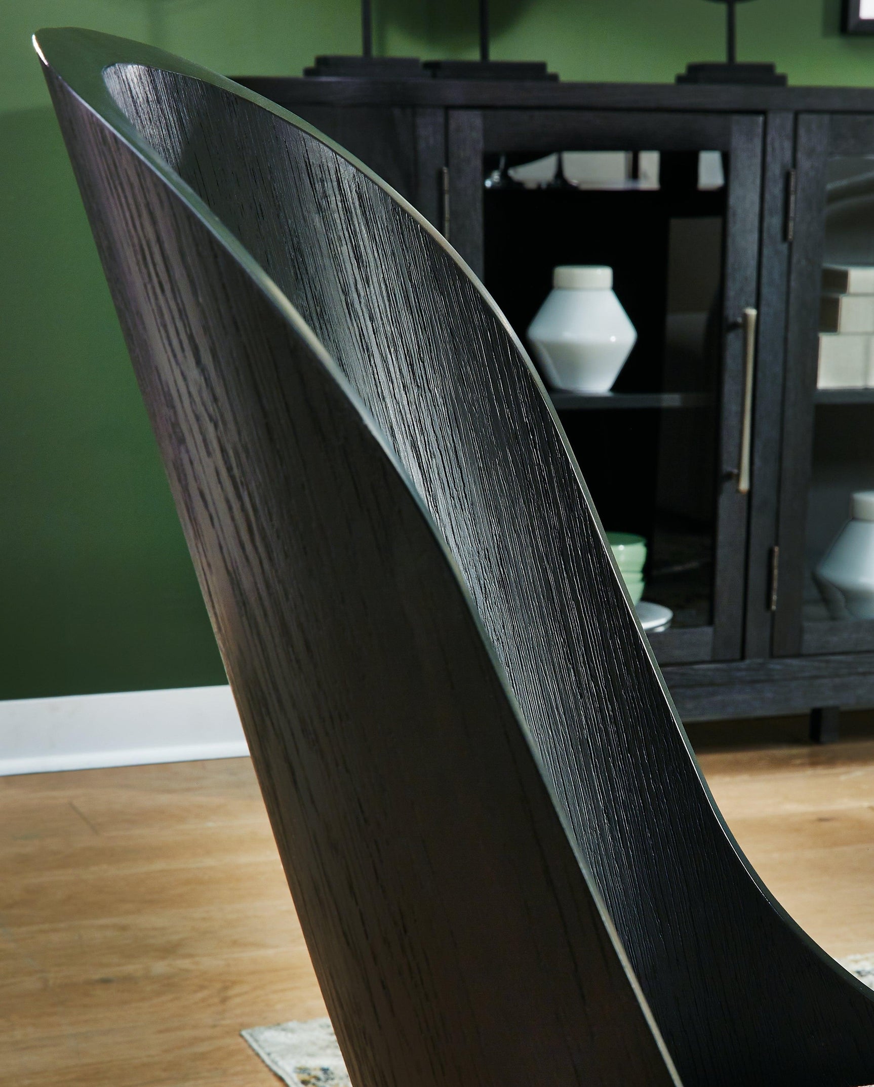 Bent plywood black finish chair back close-up
