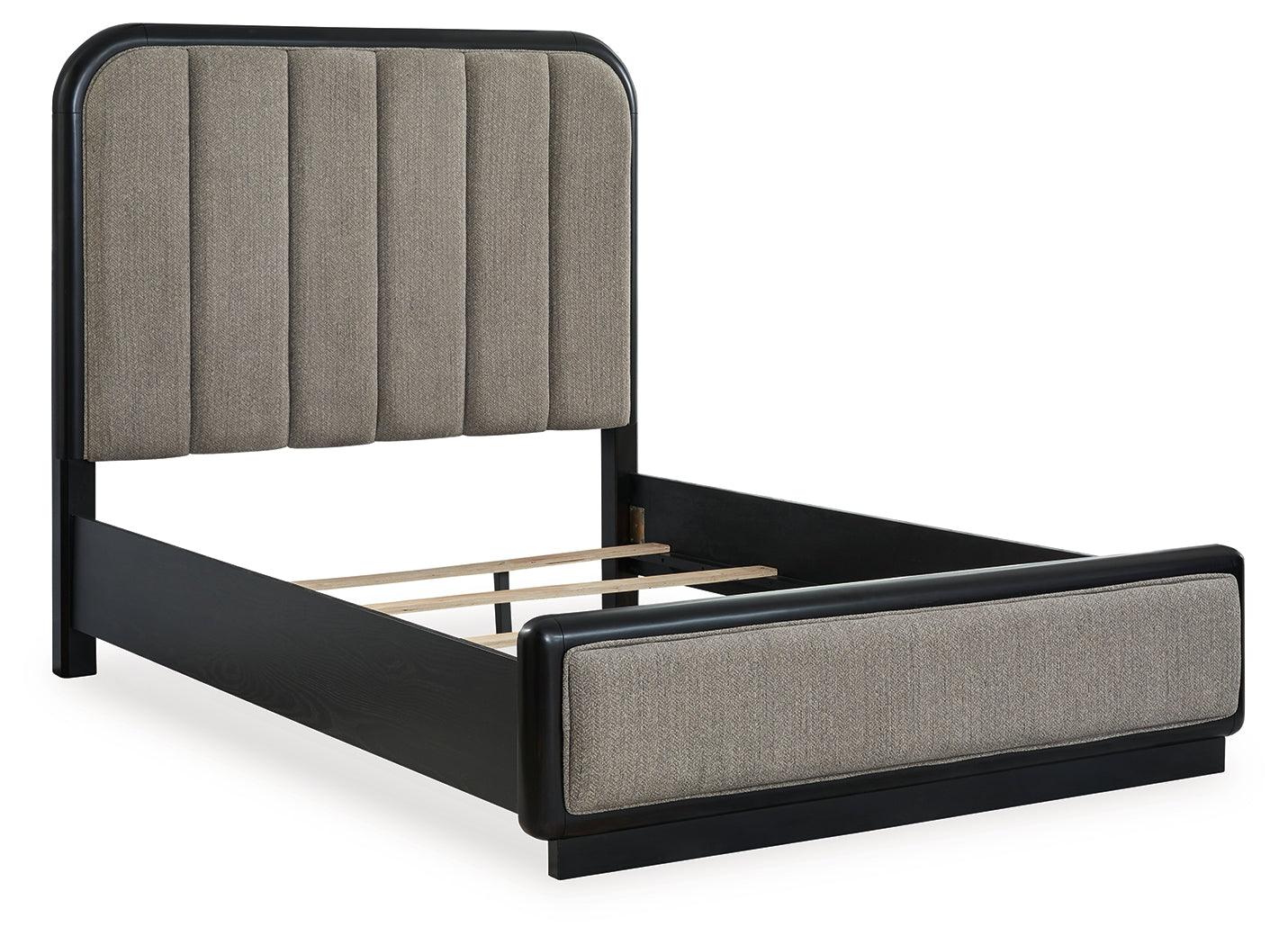 Rowanbeck Gray Black Queen Upholstered Panel Bed headboard close-up