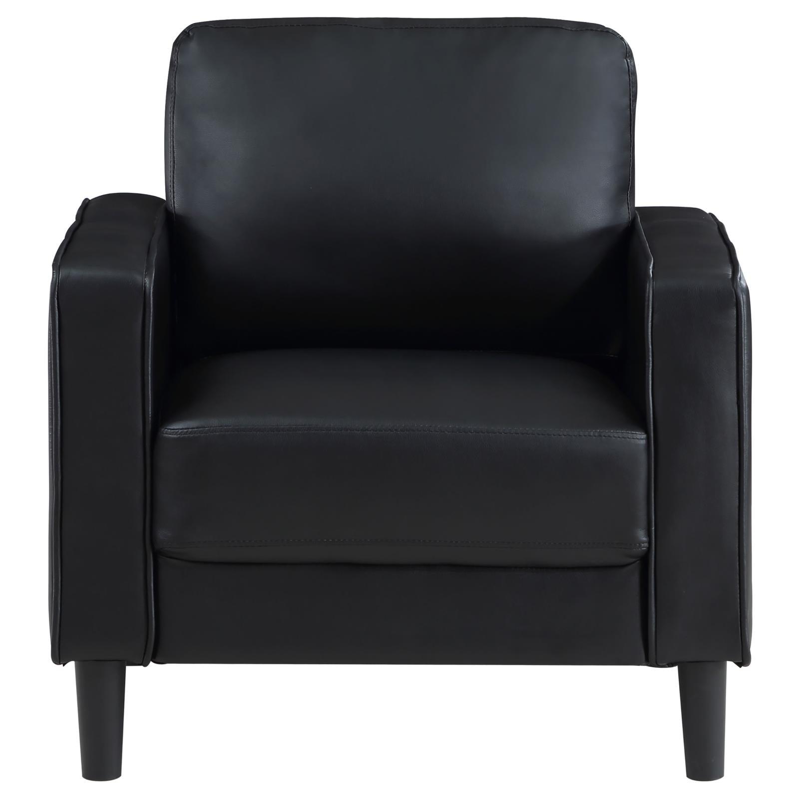 Close-up of black leatherette upholstery and track arm detail